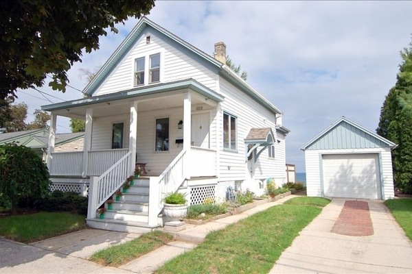 Street view with Front porch and Garage