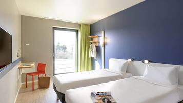 Zweibettzimmer, 2 Einzelbetten | Zimmersafe, schallisolierte Zimmer