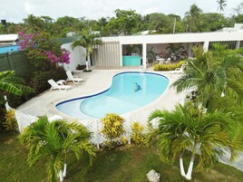 Outdoor pool, pool umbrellas, pool loungers