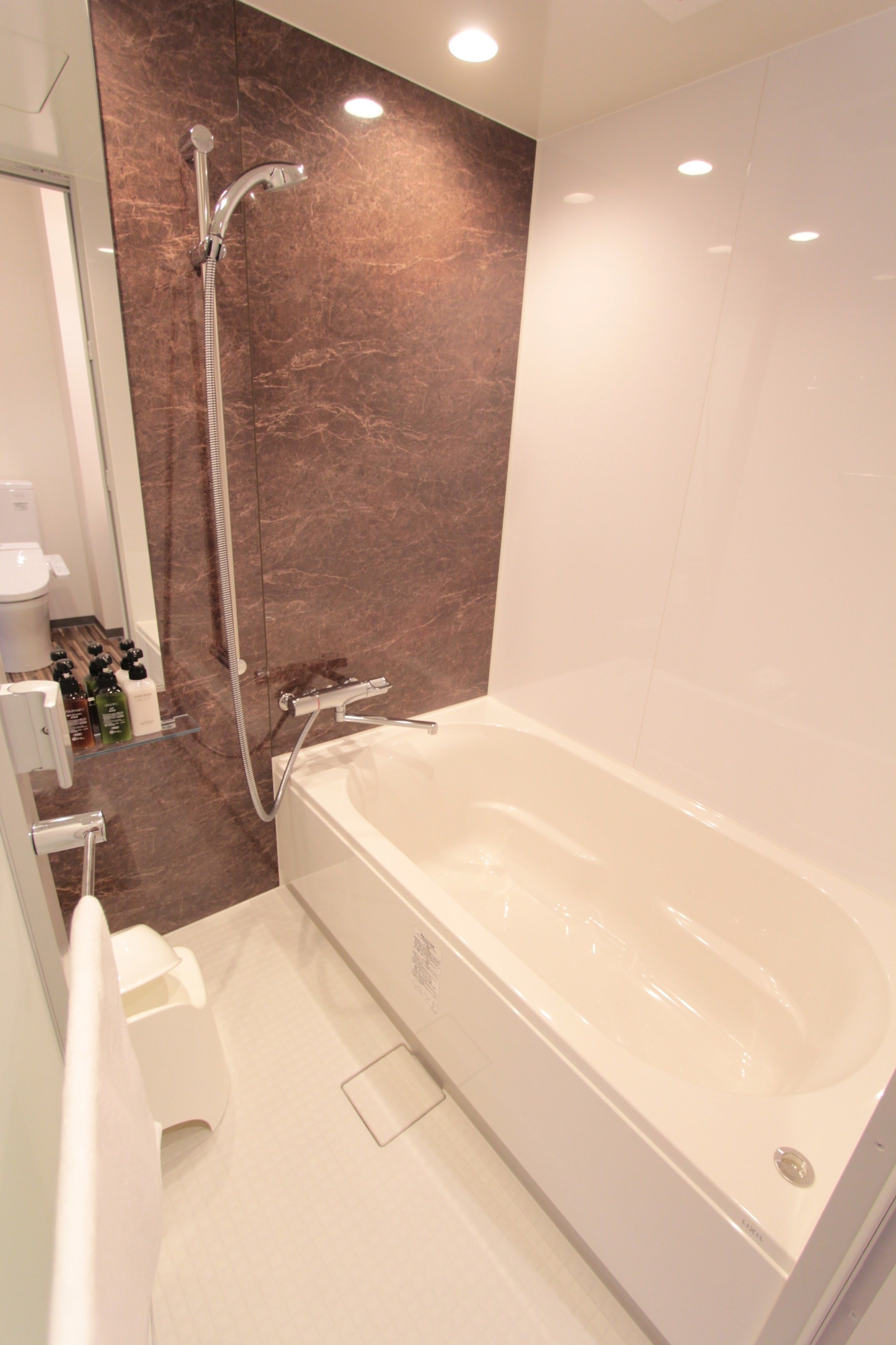 separate bathtub and shower, deep-soaking bathtub, free toiletries