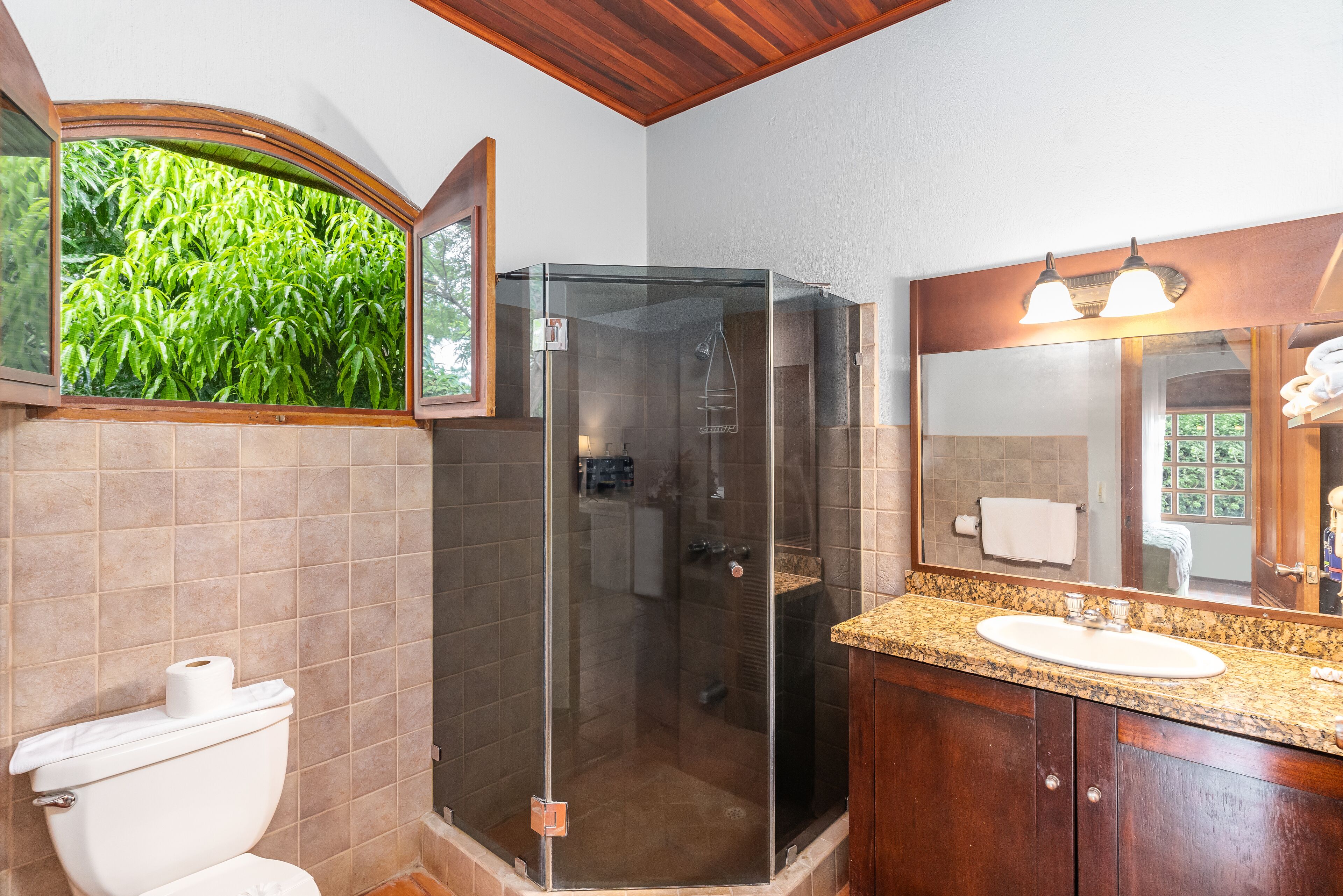 superior room with king bed | bathroom | free toiletries, hair dryer, towels