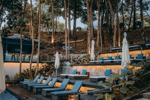 2 outdoor pools, open 8:00 AM to 7:00 PM, pool umbrellas, sun loungers