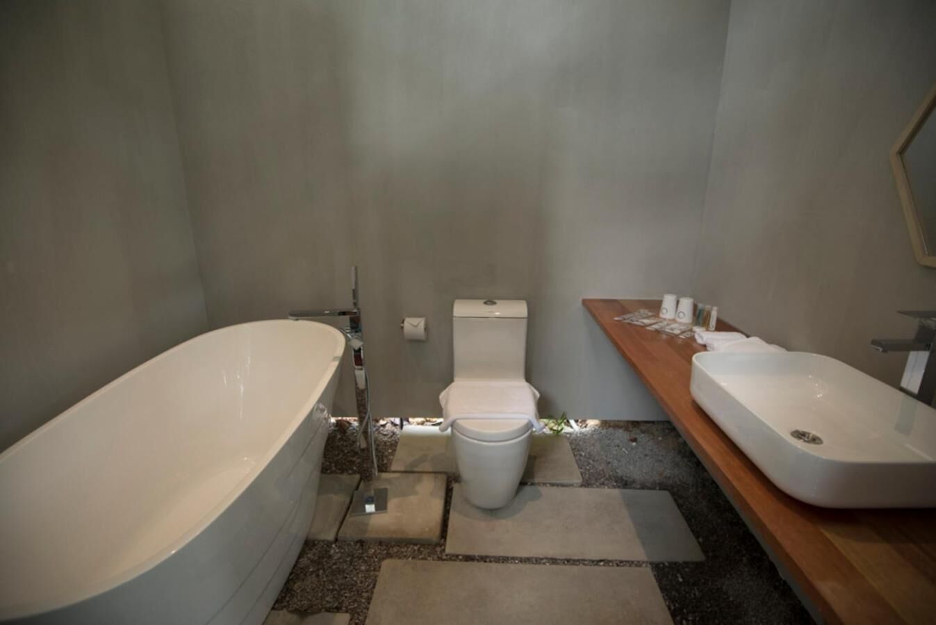 sea view suite | bathroom | slippers, towels