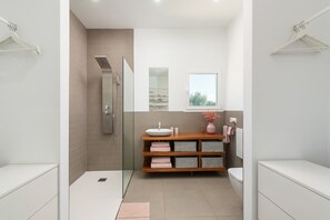 Shower, hair dryer, towels, soap