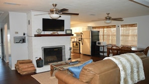 Smart TV, fireplace, books