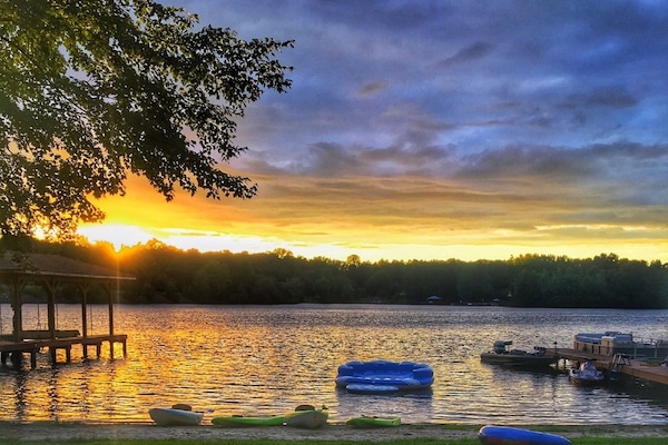 beautiful sunset over the water at the fire pit -float, boathouse not included