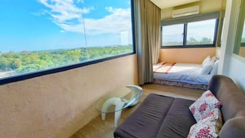 Family Room, Balcony | Blackout drapes, soundproofing, free WiFi, bed sheets