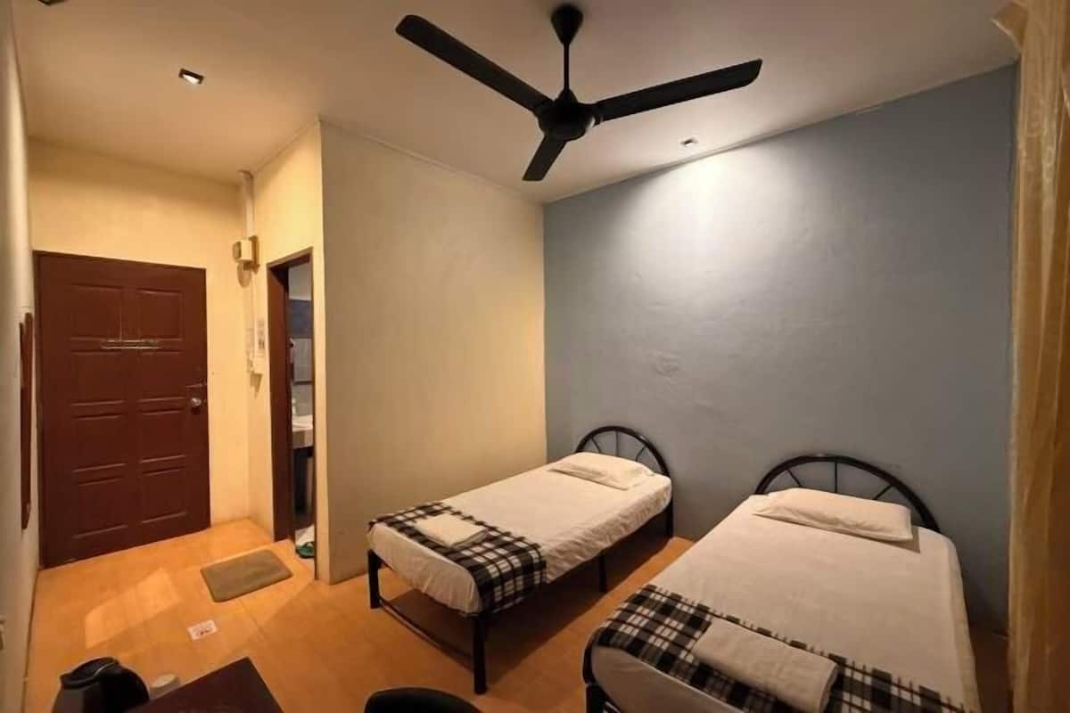 Desk, iron/ironing board (on request), bed sheets