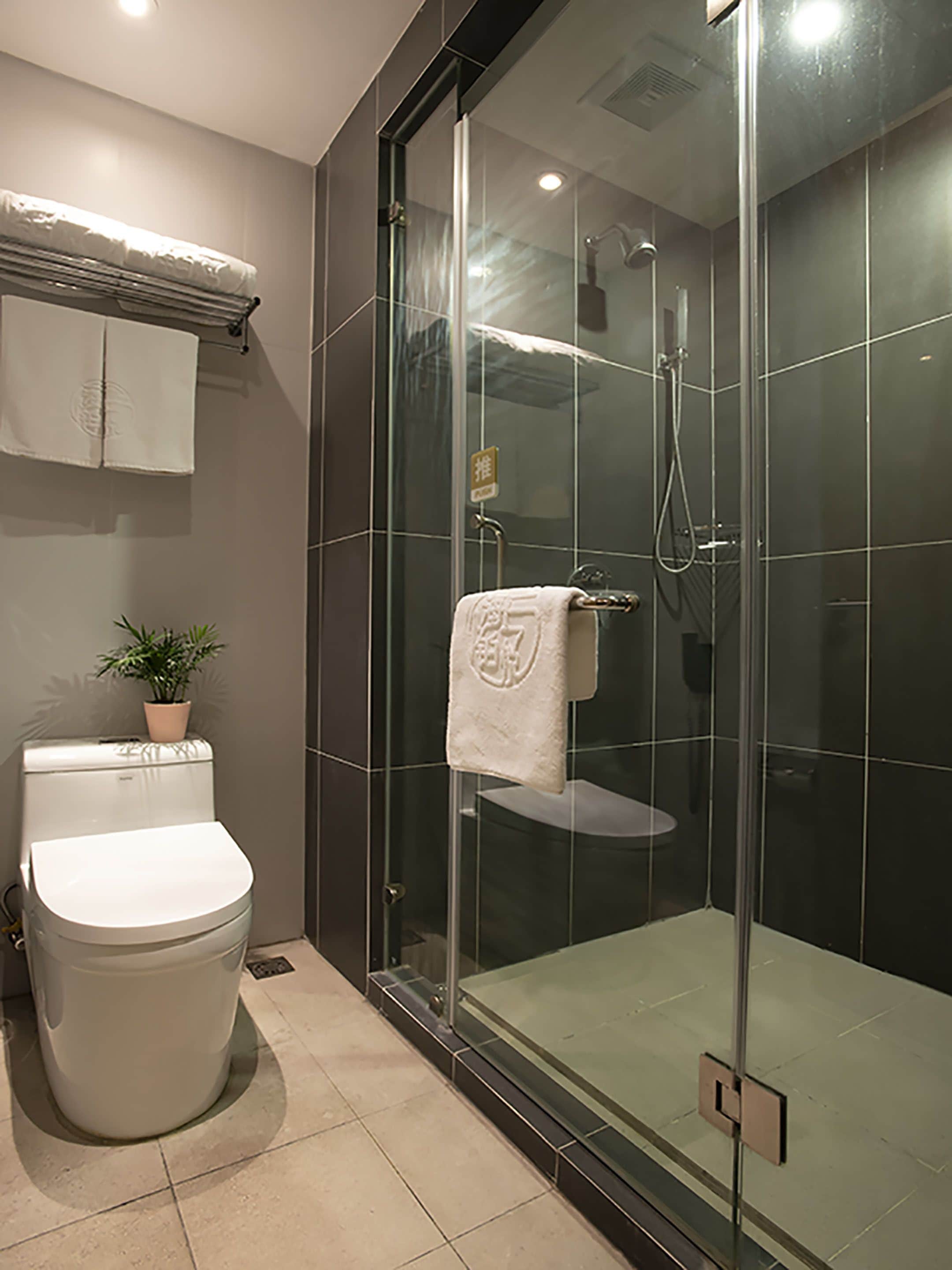 deluxe twin room - afternoon tea set | bathroom | free toiletries, hair dryer, bathrobes, slippers