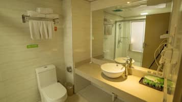 Shower, free toiletries, hair dryer, slippers
