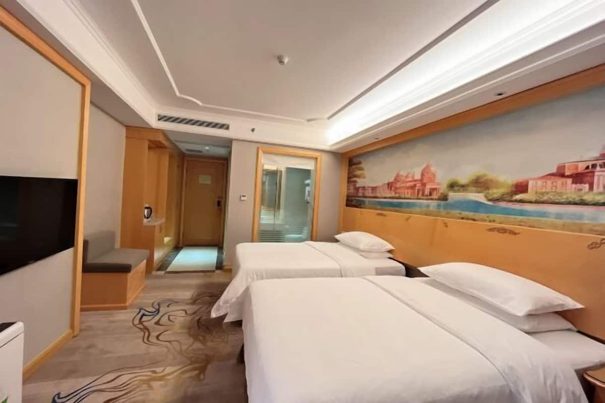 Desk, blackout drapes, iron/ironing board, rollaway beds