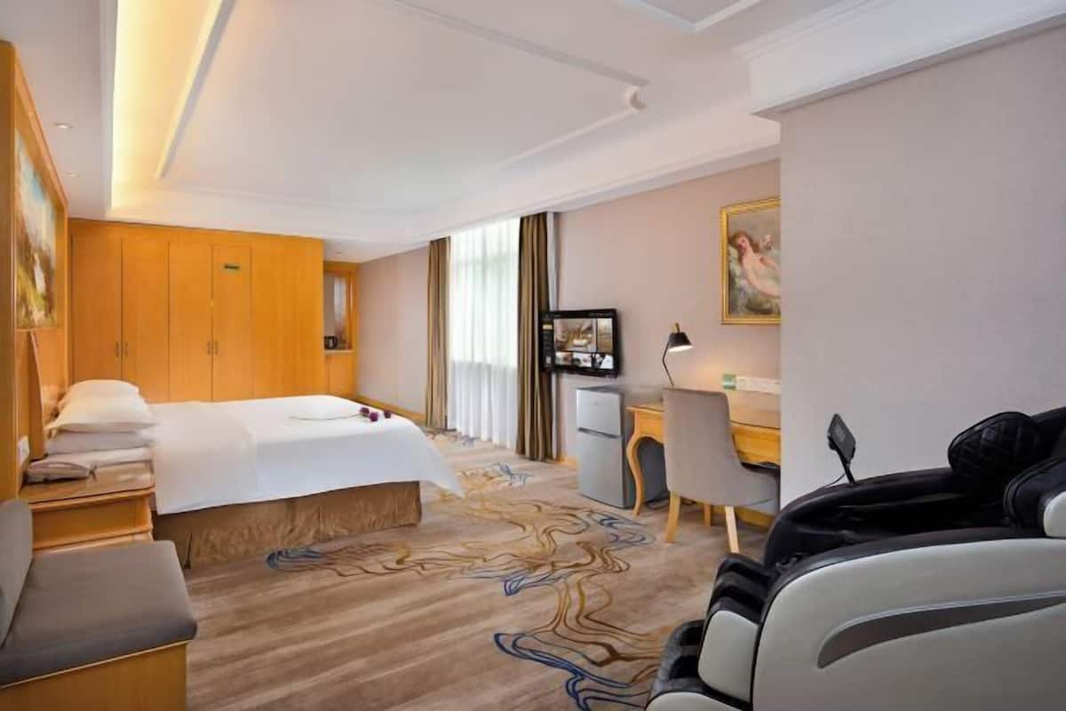 Desk, blackout drapes, iron/ironing board, rollaway beds