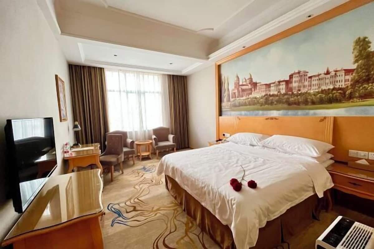 Desk, blackout drapes, iron/ironing board, rollaway beds