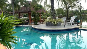 Outdoor pool, pool umbrellas, pool loungers