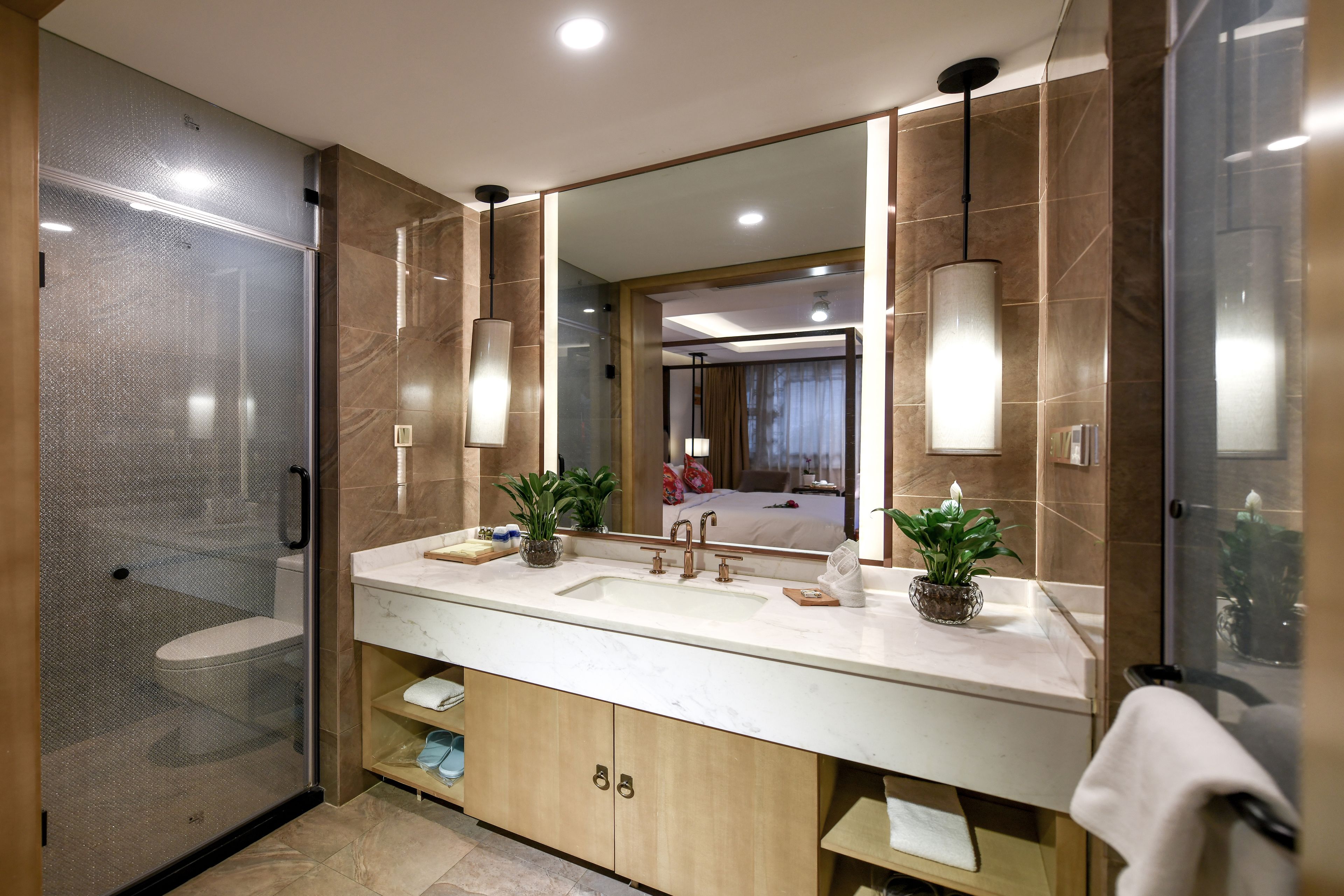 deluxe king room (free train station pick up) | bathroom | shower, rainfall showerhead, designer toiletries, hair dryer