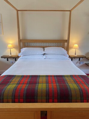Premium bedding, desk, laptop workspace, blackout curtains