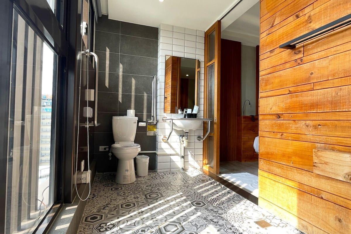 accessible double room | bathroom | shower, hair dryer, towels