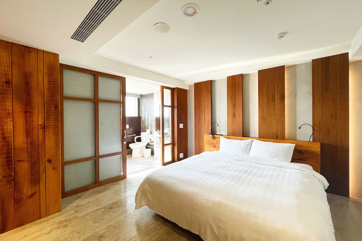 Down comforters, desk, blackout drapes, soundproofing