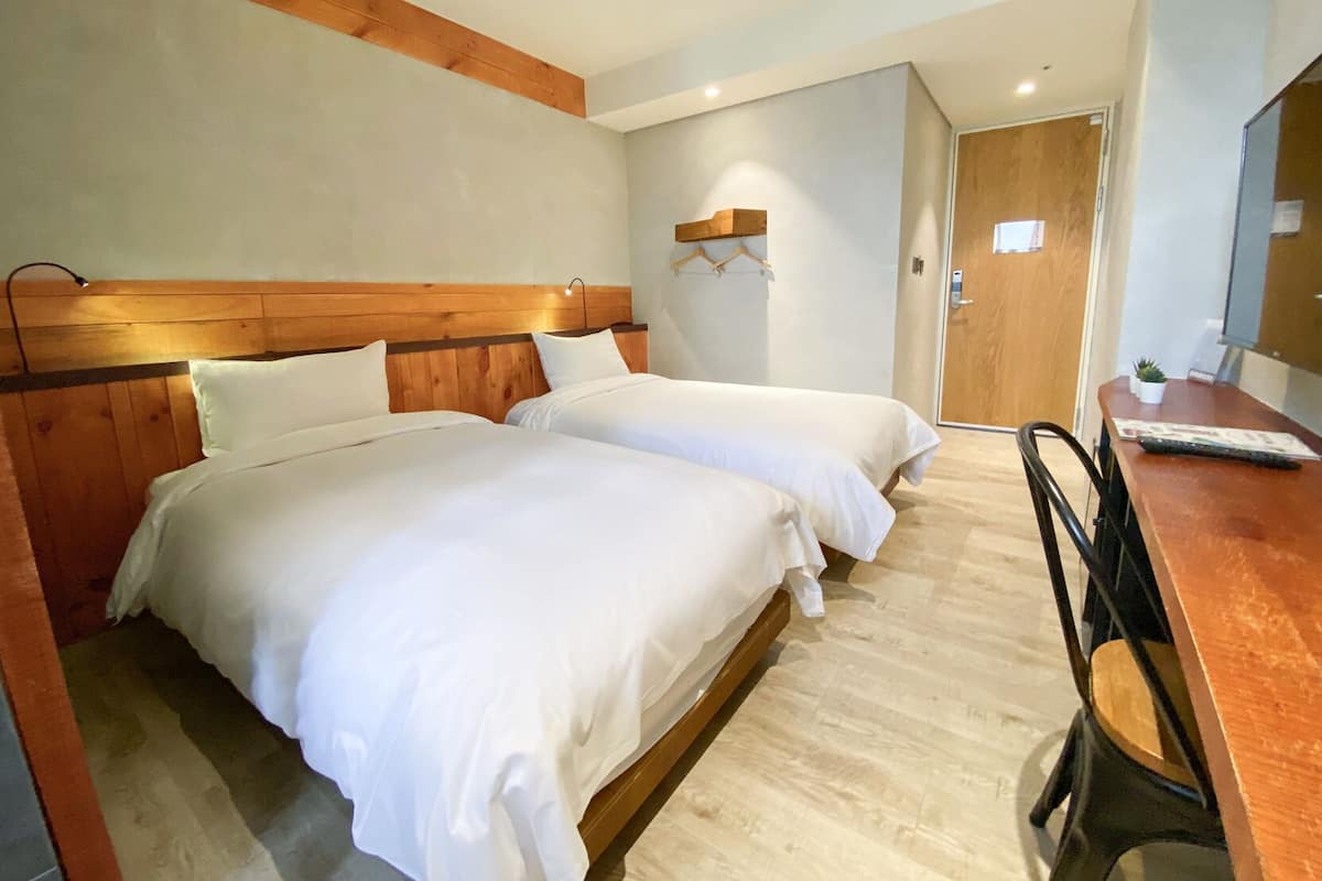 Down comforters, desk, blackout drapes, soundproofing