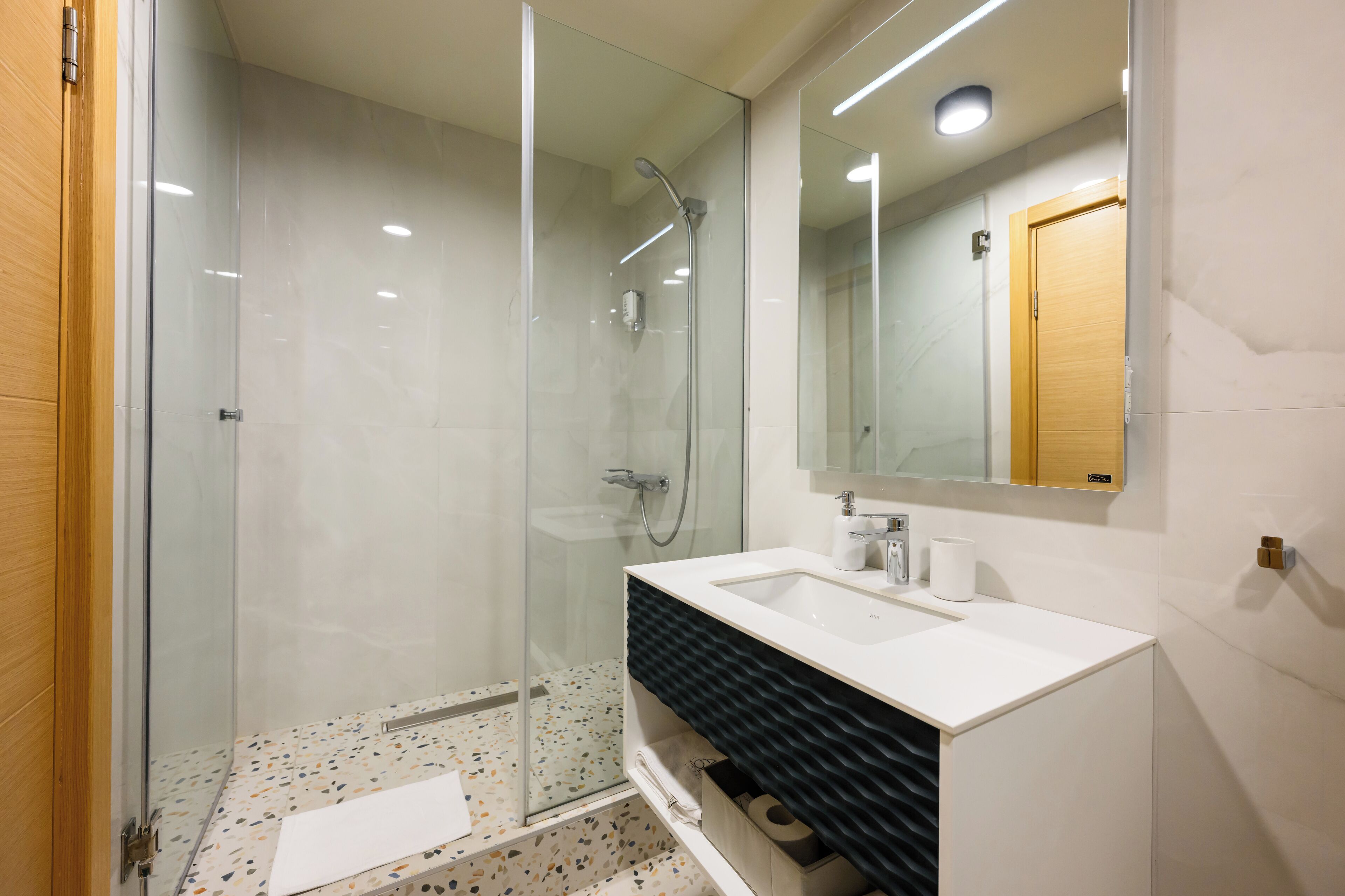 shower, free toiletries, hair dryer, bathrobes