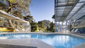 Indoor pool, outdoor pool, open 8:00 AM to 9:00 AM, pool umbrellas