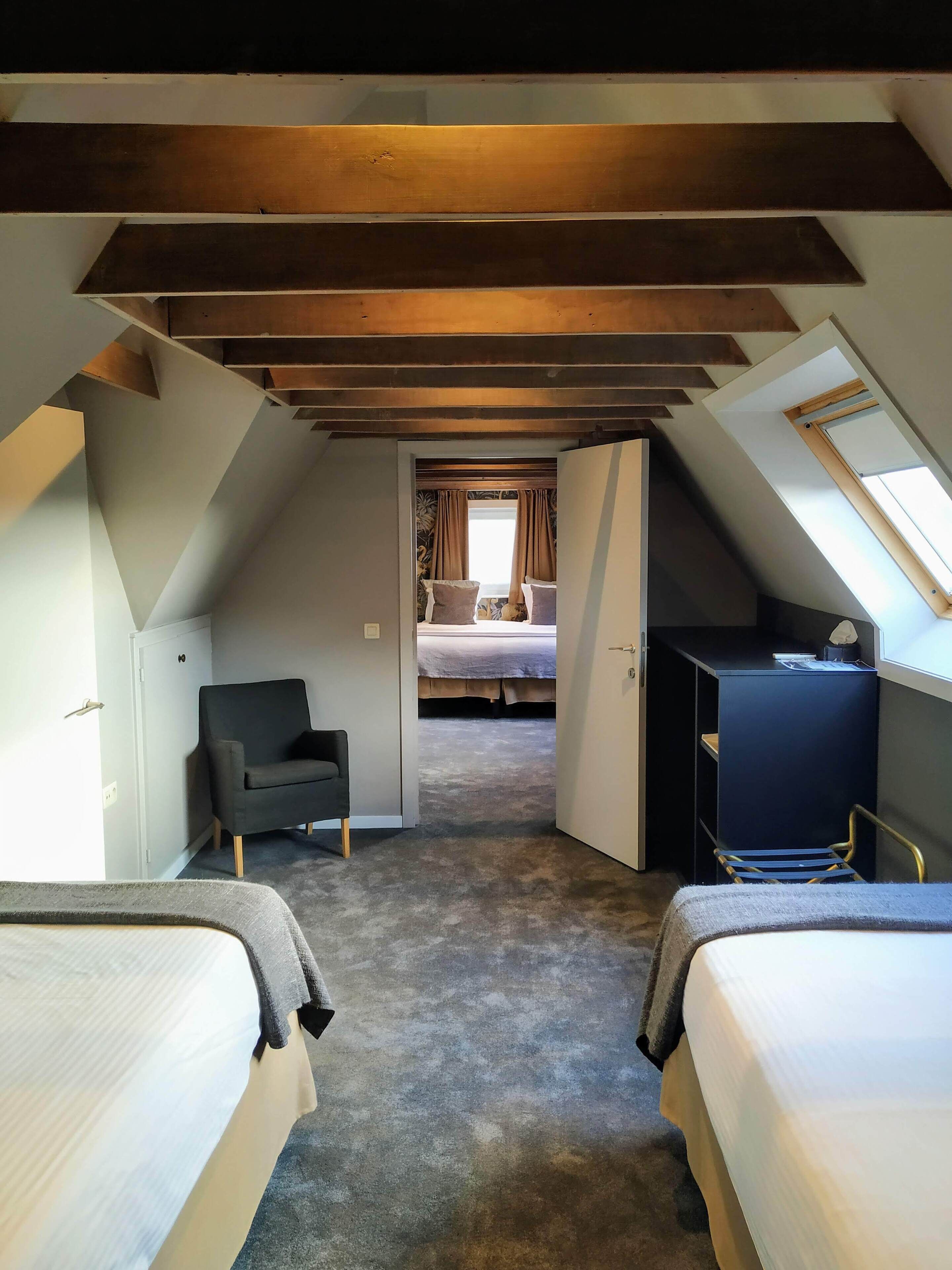 family room | 1 bedroom, premium bedding, minibar, in-room safe