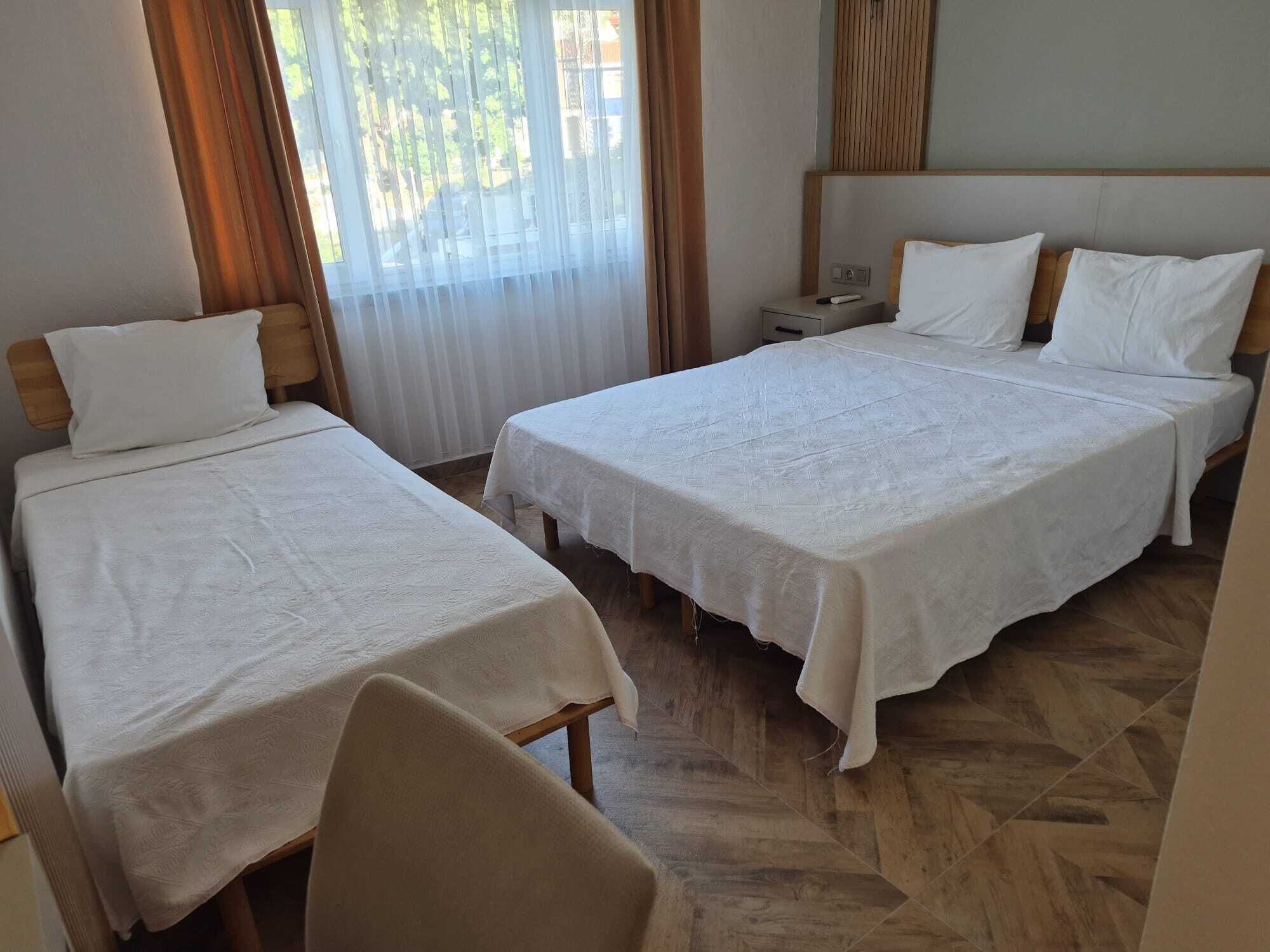 Triple Room | Iron/ironing board, free cribs/infant beds, free WiFi