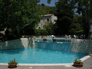 Outdoor pool, pool umbrellas, sun loungers