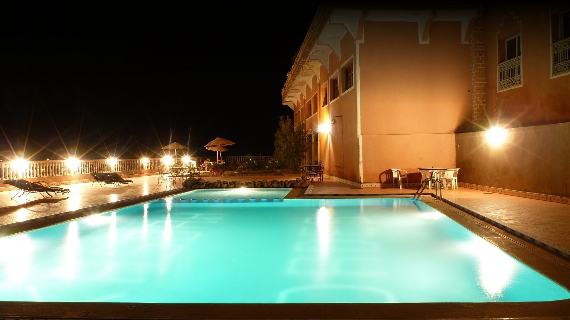 Outdoor pool, pool umbrellas, pool loungers