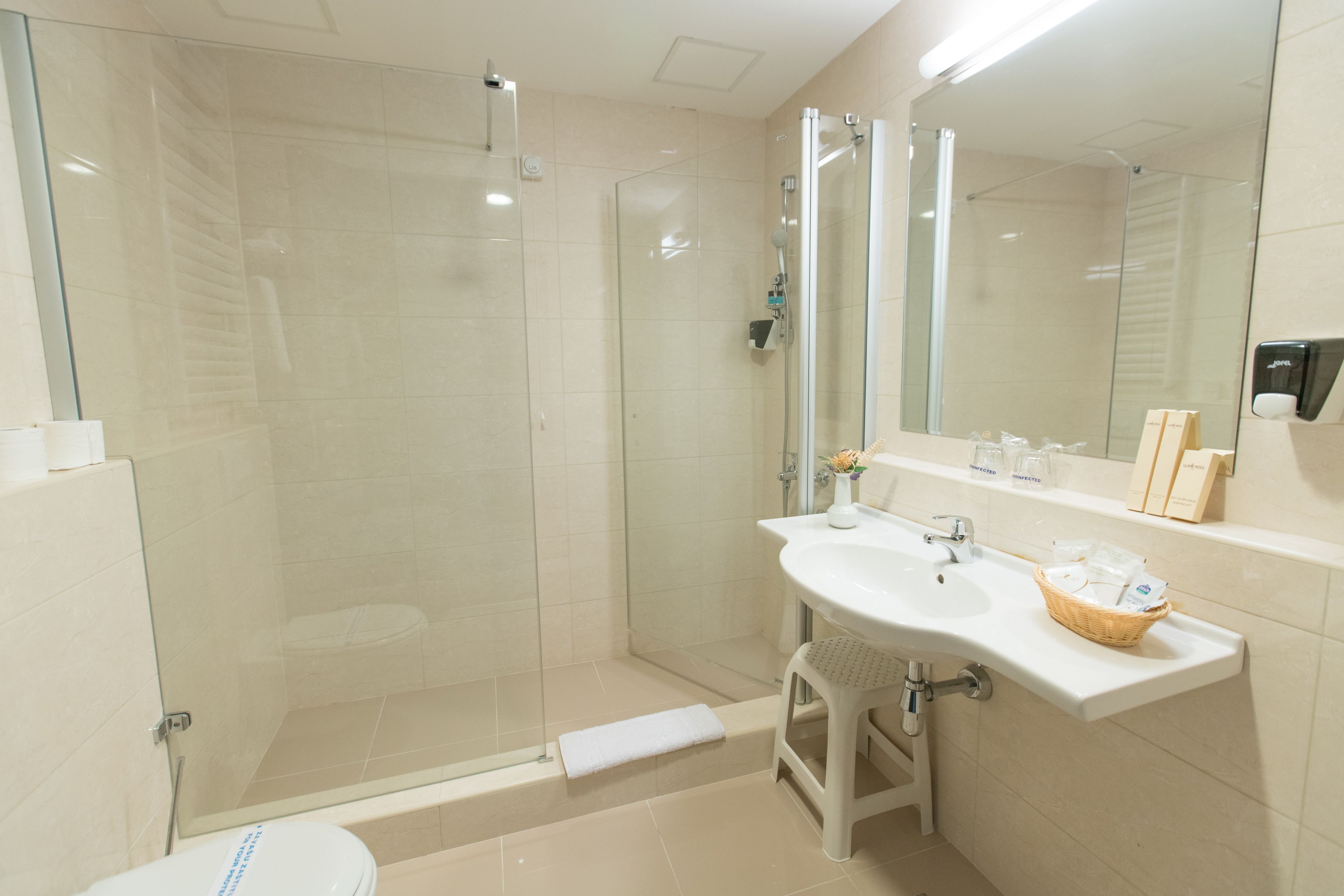 family room | bathroom | shower, free toiletries, hair dryer, towels