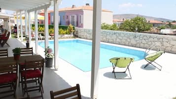 Outdoor pool, pool umbrellas, pool loungers