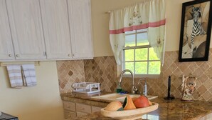 Honeymoon Suite, 1 Queen Bed | Private kitchen | Coffee/tea maker, fridge, microwave, oven - Ocean Bliss Apartments (Inch Marlowe)