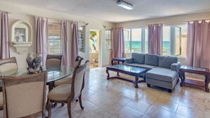 Honeymoon Suite, 1 Queen Bed | Living area | 41-inch TV with cable channels - Ocean Bliss Apartments (Inch Marlowe)
