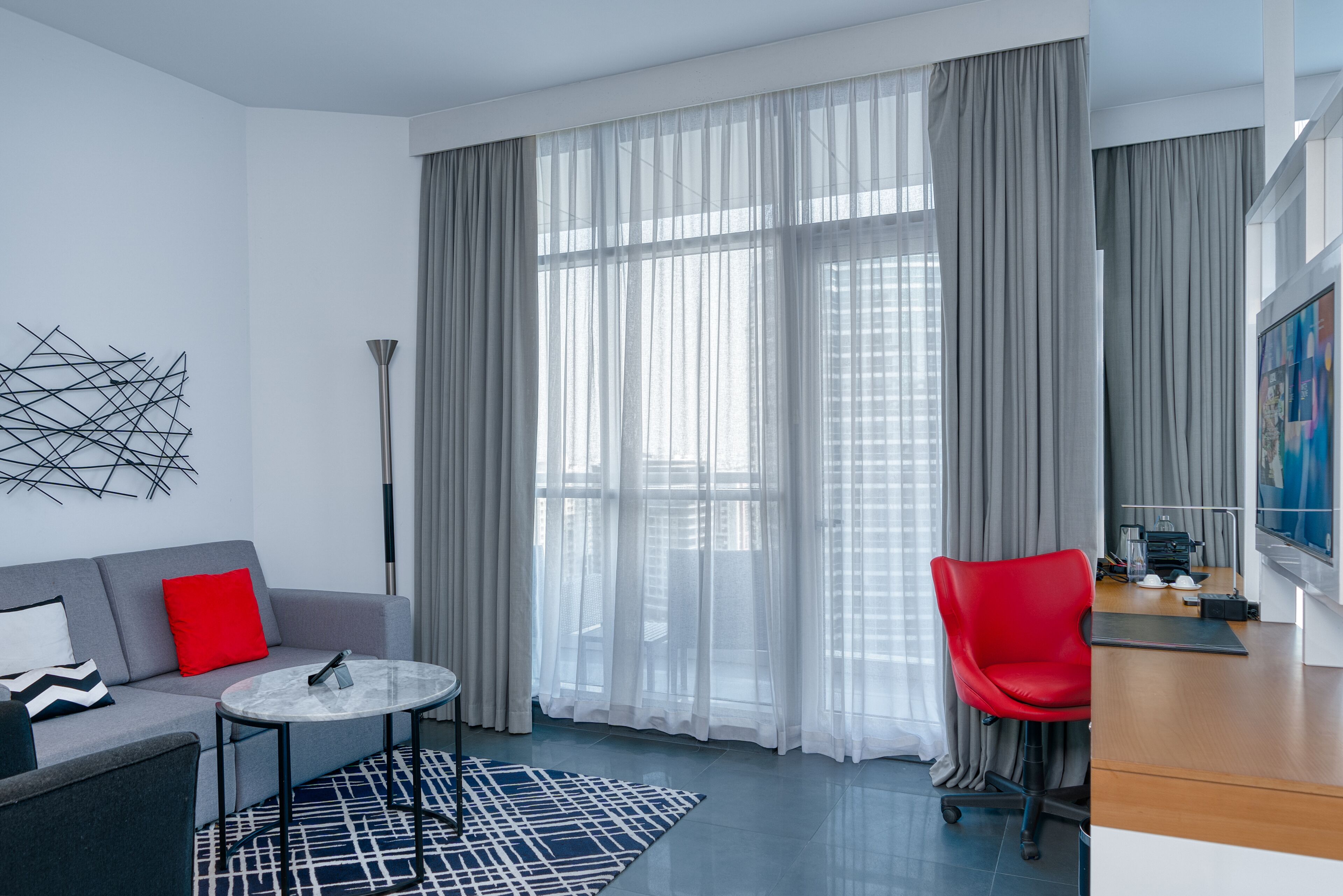 tryp premium suite  | living area | tv