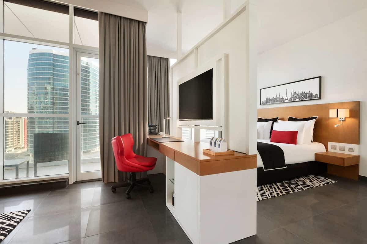 TRYP Premium Suite | 1 bedroom, down comforters, minibar, in-room safe