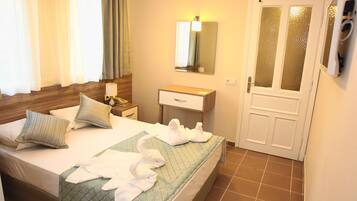 Apartemen, 2 kamar tidur | 1 kamar tidur, brankas, meja kerja, dan Wi-Fi gratis