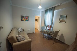 Apartment, 1 Bedroom | Living area | LED TV
