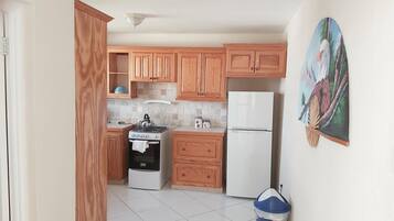 Apartment, 1 Bedroom | Private kitchen | Fridge, microwave, oven, stovetop