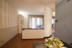 Apartment, 1 Bedroom | Living area | Flat-screen TV