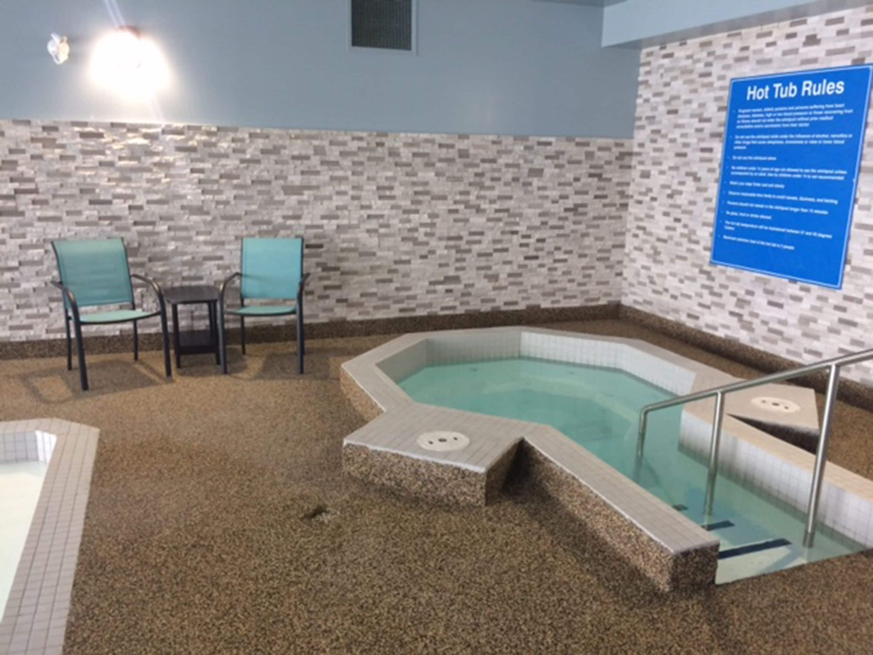 indoor pool, open 9:00 am to 10:00 pm, pool loungers