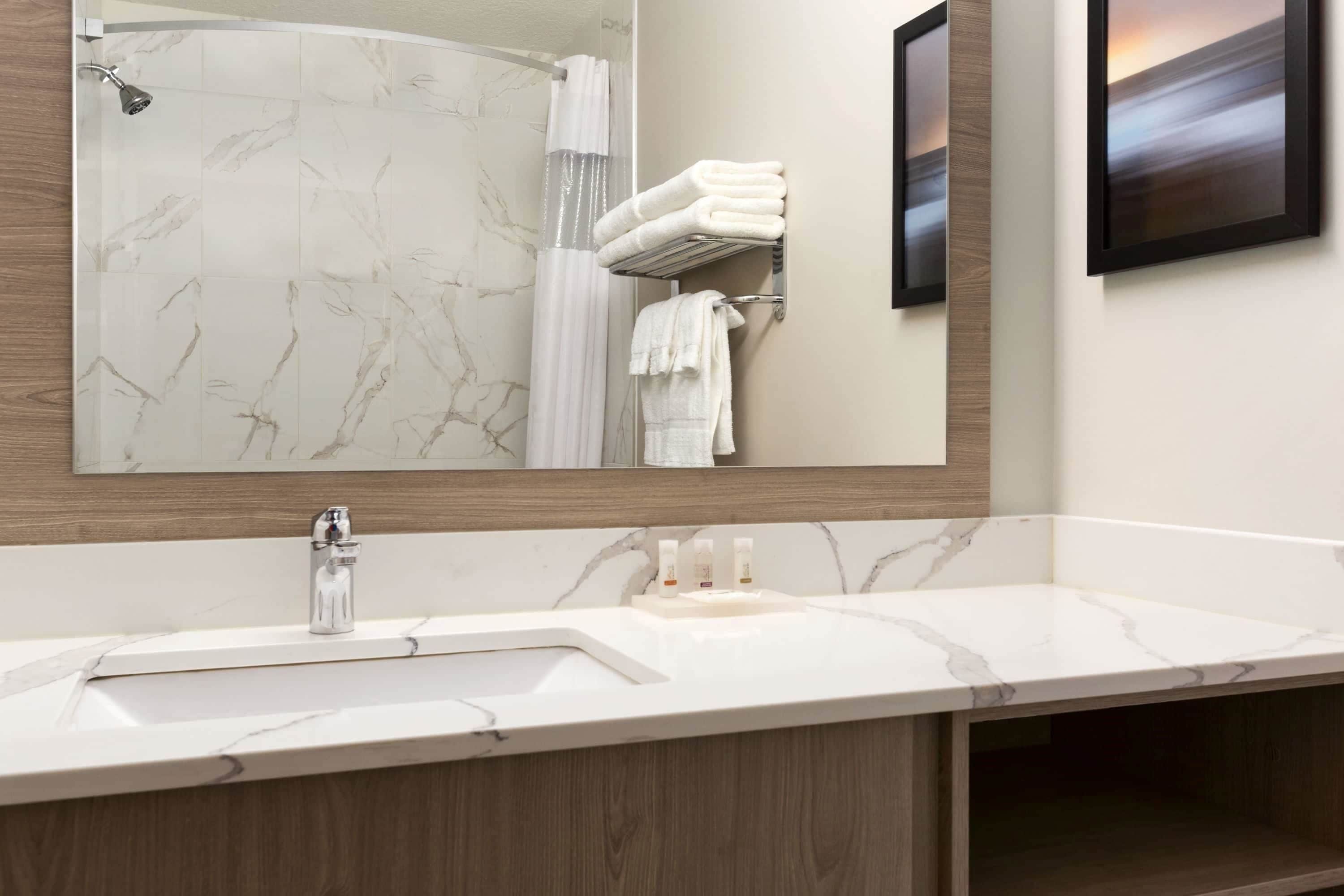 combined shower/bathtub, free toiletries, hair dryer, towels