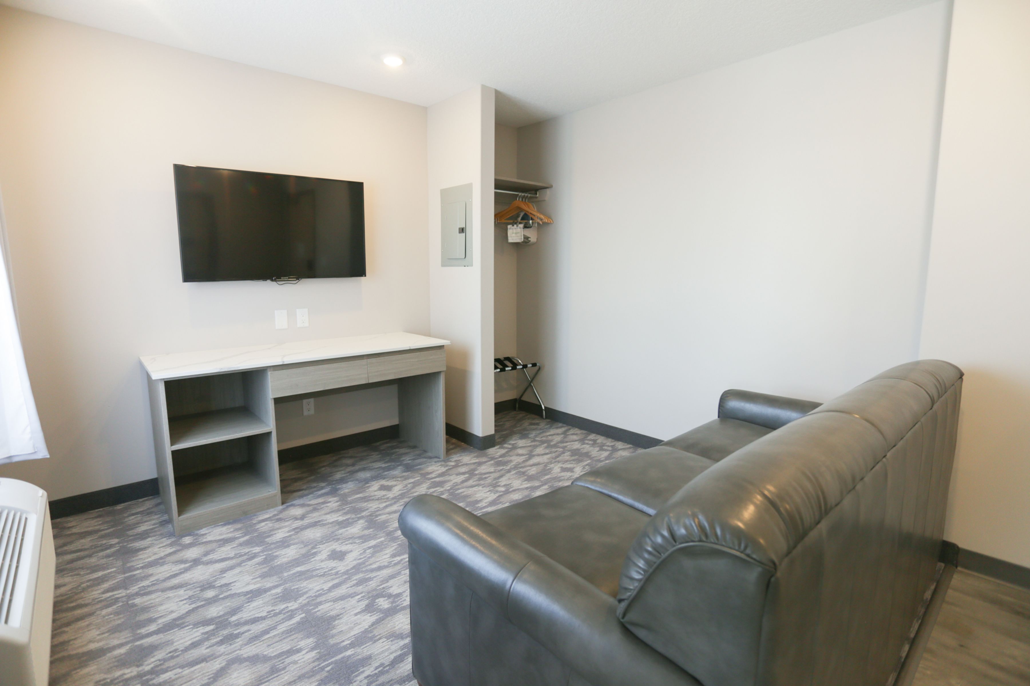 suite, 1 king bed, non smoking | living area | flat-screen tv, pay films