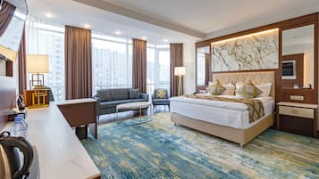 Premium Room, 1 King Bed, Non Smoking | Minibar, in-room safe, desk, laptop workspace