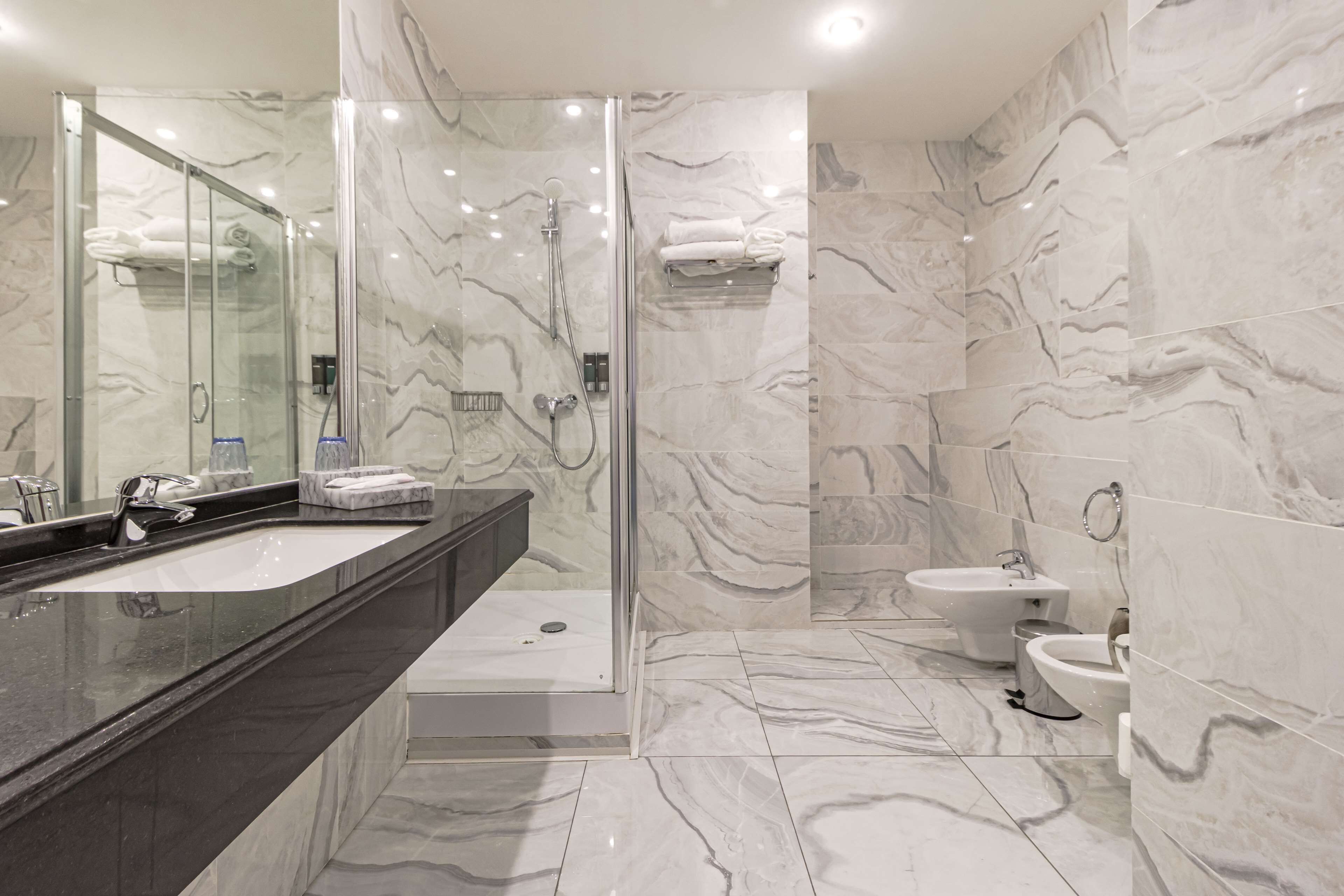 combined shower/bathtub, free toiletries, hair dryer, bathrobes