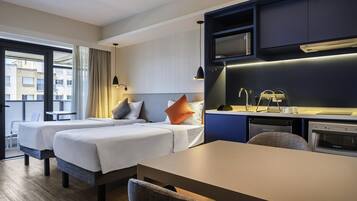 Appartement Supérieur, 2 lits une place | Coffres-forts dans les chambres, bureau