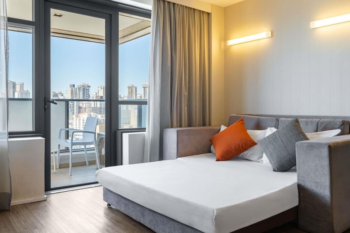 In-room safe, desk, laptop workspace, blackout curtains