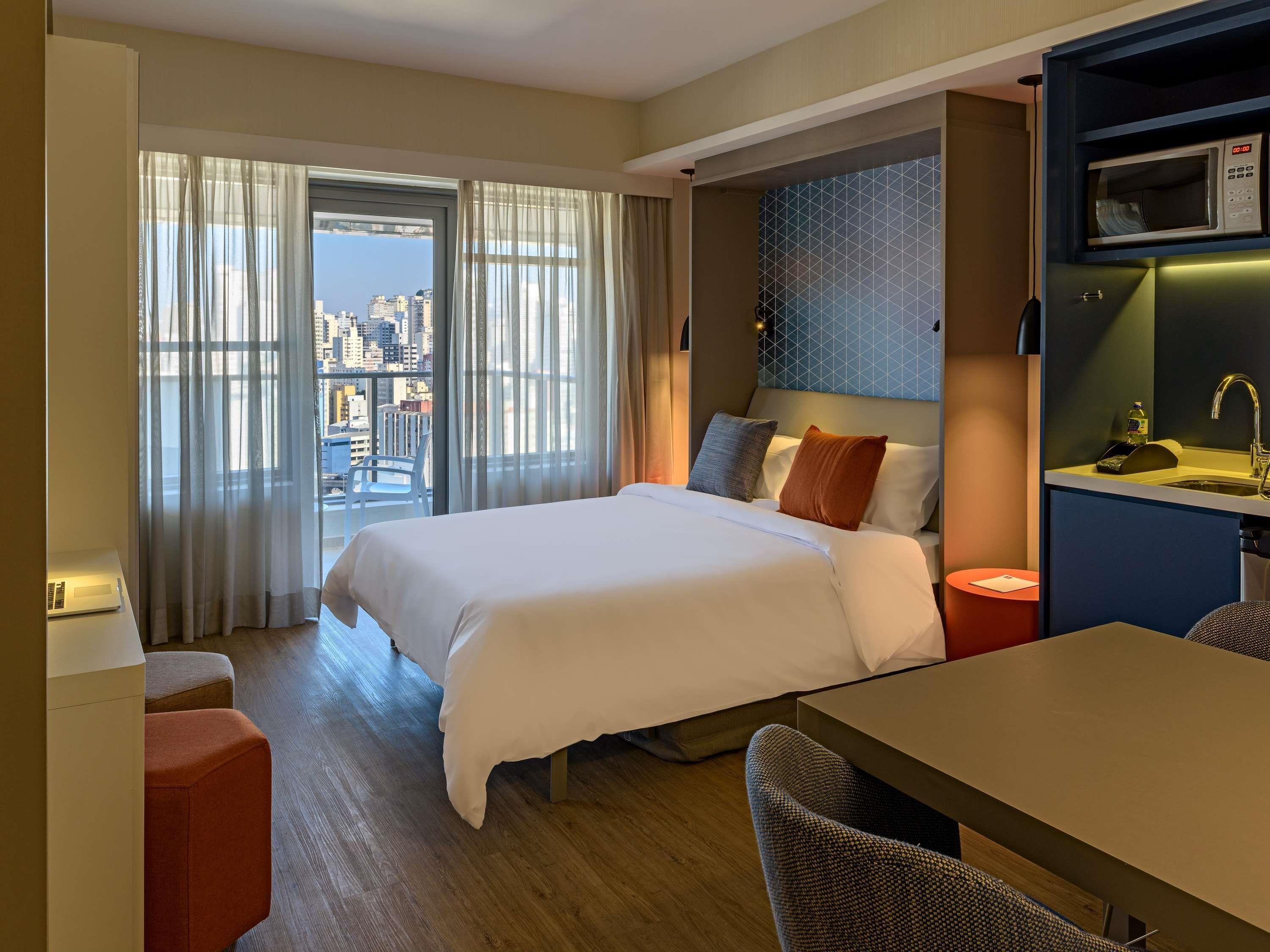 In-room safe, desk, laptop workspace, blackout curtains