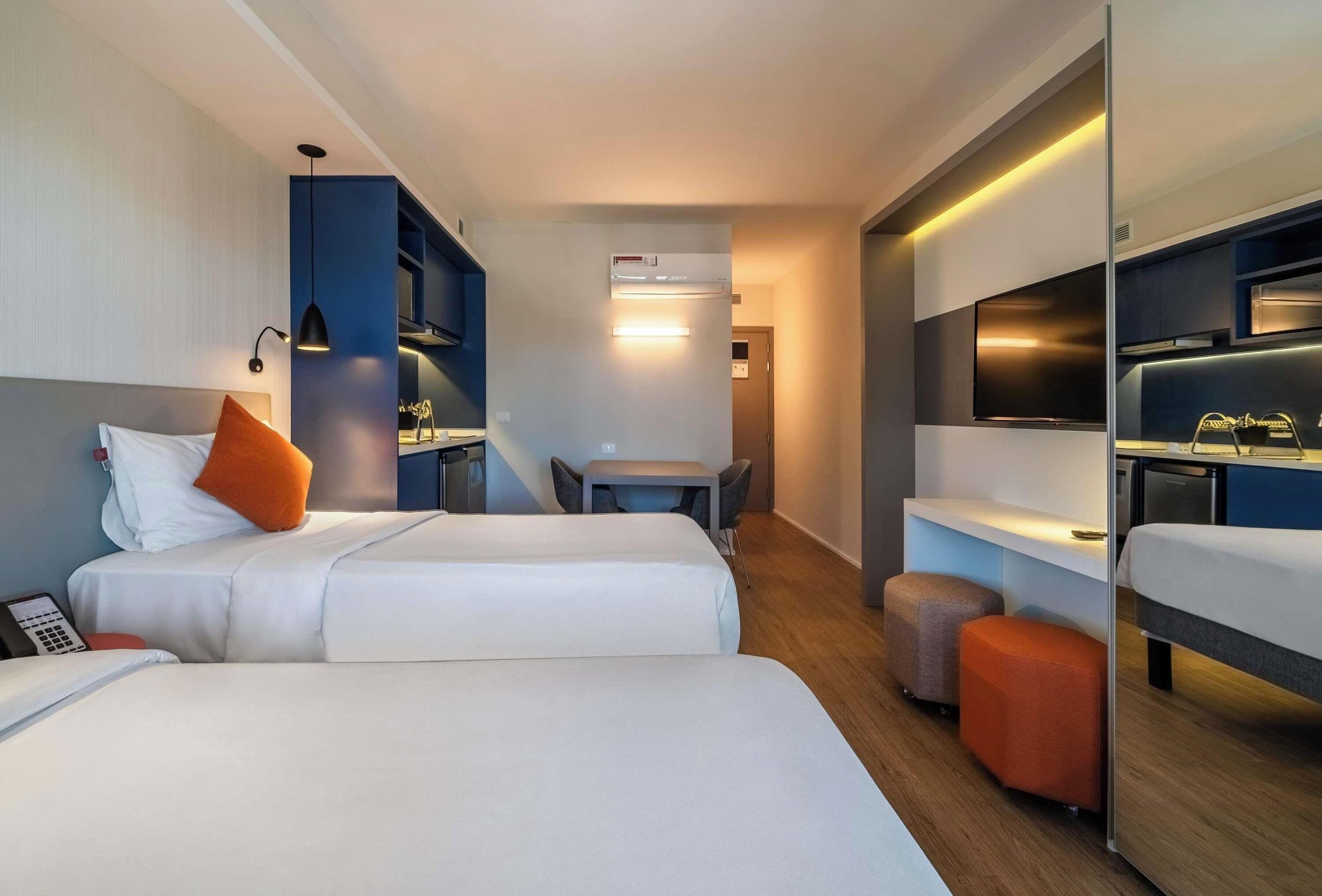 Superior Apartment, 2 Twin Beds | In-room safe, desk, laptop workspace, blackout drapes