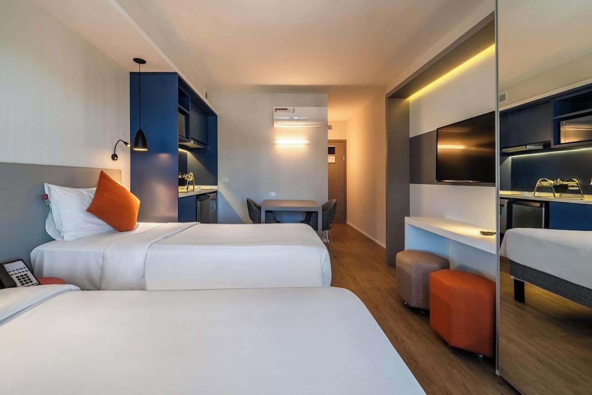 Superior Apartment, 2 Twin Beds | In-room safe, desk, laptop workspace, blackout drapes