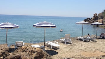 Private beach, sun-loungers, beach umbrellas